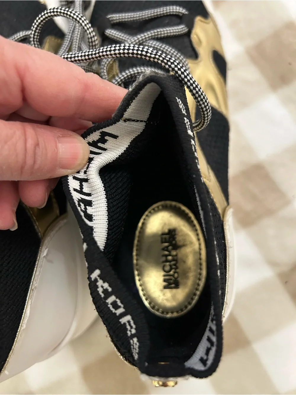 Michael Kors Black, Gold and White Women’s Slip-On Lace Sneakers